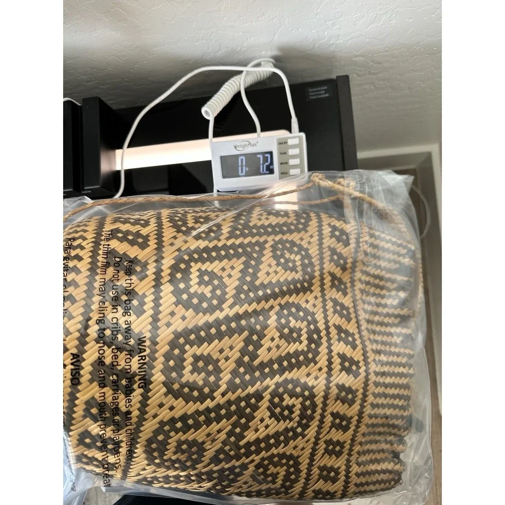 Natural‎ Rattan Backpack featuring a dayak tribal-inspired.